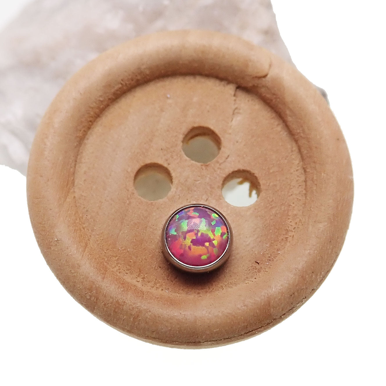 Rose-pink cabochon opal top body jewelry by Body Clickers, 16g, featuring a smooth, polished gemstone for piercing adornment.