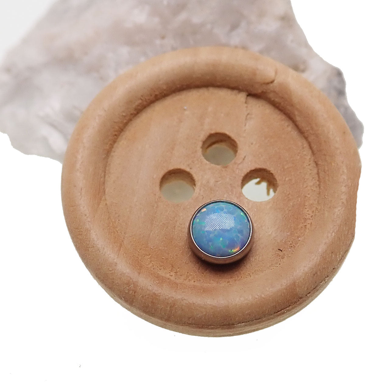 Cornflower-blue cabochon opal top for body jewelry by Body Clickers, showcasing a 16g body piercing accessory.