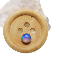 Azure-blue cabochon opal top for body jewelry by Body Clickers, 16g body piercing accessory with vibrant gemstone design.