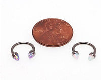 Black cherry horseshoe body jewelry with 4mm spiked opal cone ends, 16g, featuring a stylish horseshoe piercing design.