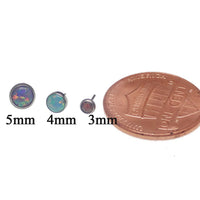 Black fire opal push fit threadless top body jewelry in implant titanium by Body Clickers, designed for body piercing.