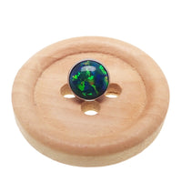 Black fire Opal push fit threadless top body jewelry in implant titanium, designed by Body Clickers.