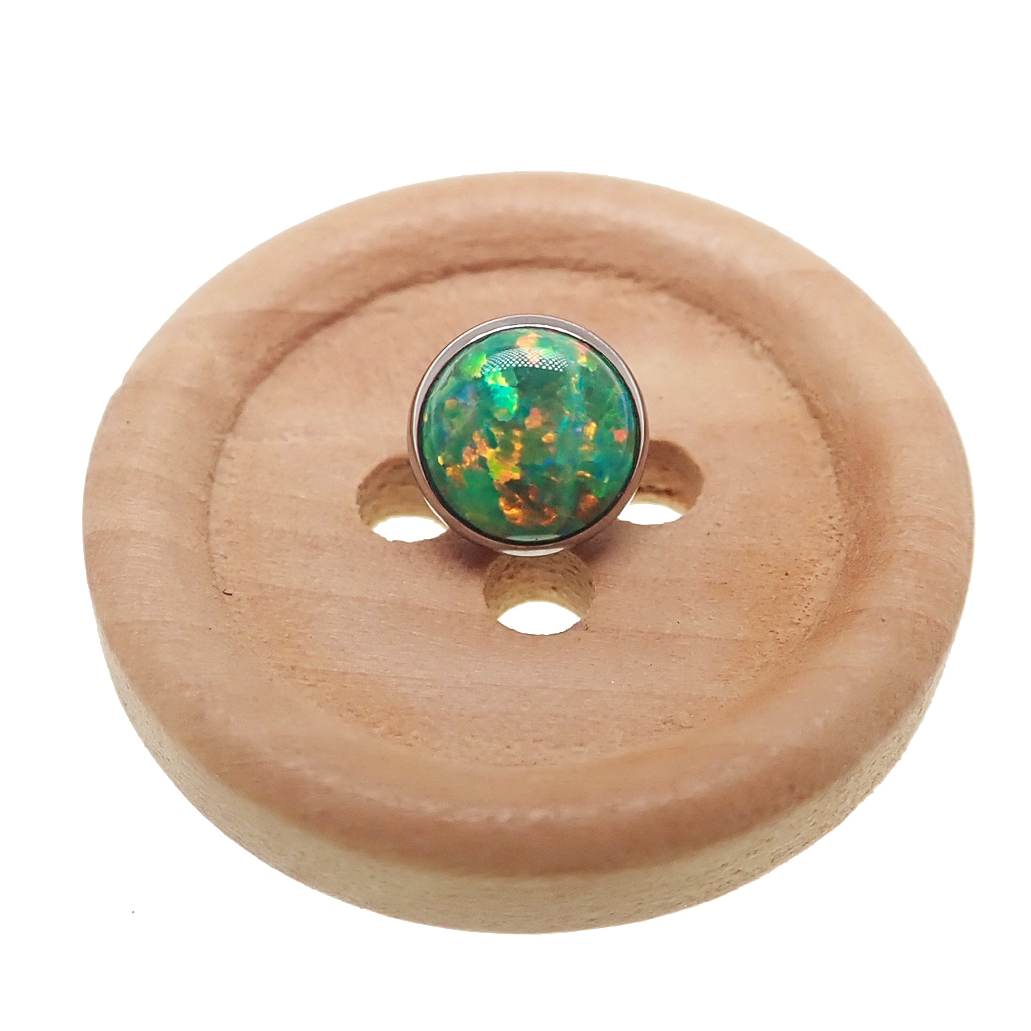 Black fire opal push fit threadless top body jewelry by Body Clickers, made of implant-grade titanium, featuring a 3mm opal.