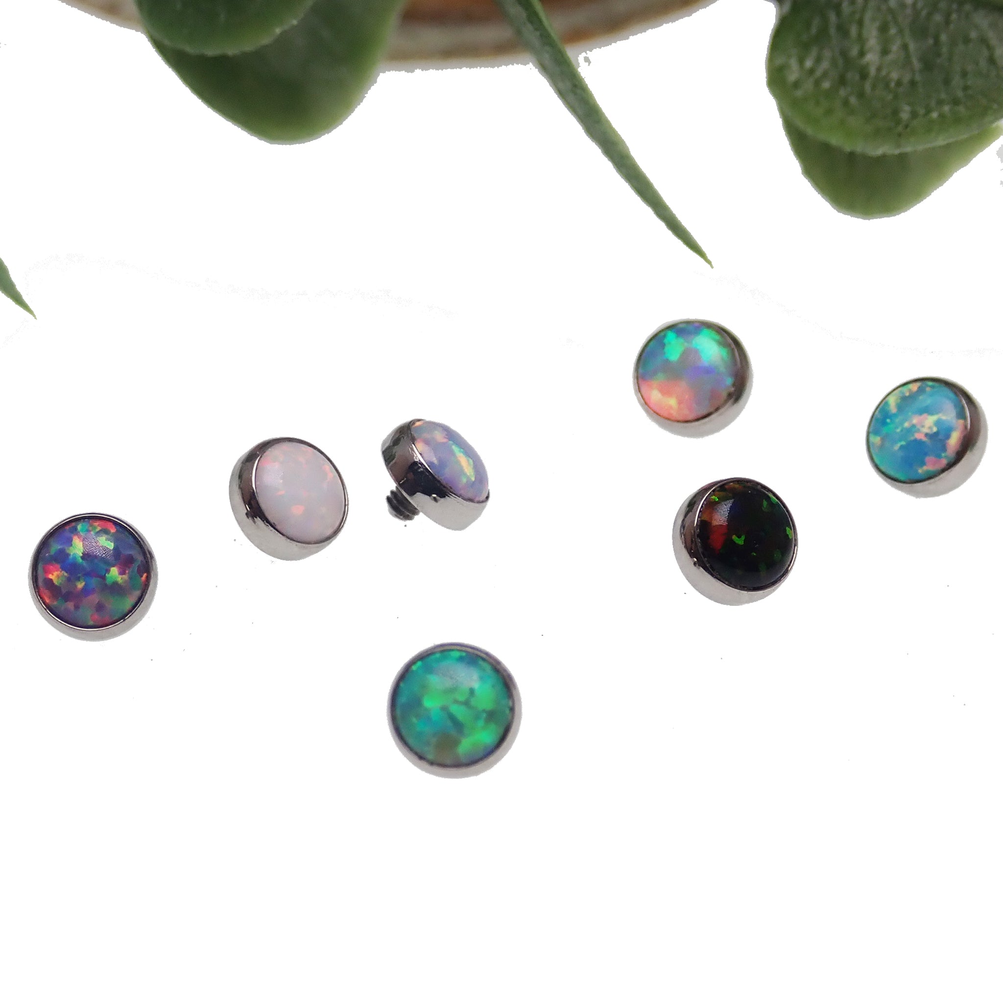 Body Clickers 14g cabochon 4mm opal flat attachment body jewelry, showcasing a shiny blue oval gemstone.