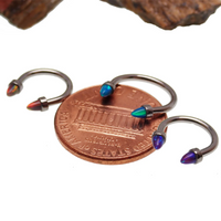 Black horseshoe piercing with 3mm spiked opal cone ends, 16g body jewelry from Body Clickers.