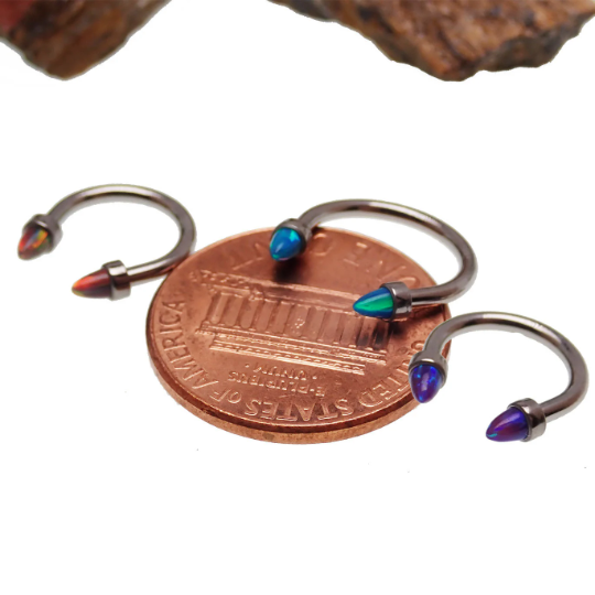 Black horseshoe piercing with 3mm spiked opal cone ends, 16g body jewelry from Body Clickers.
