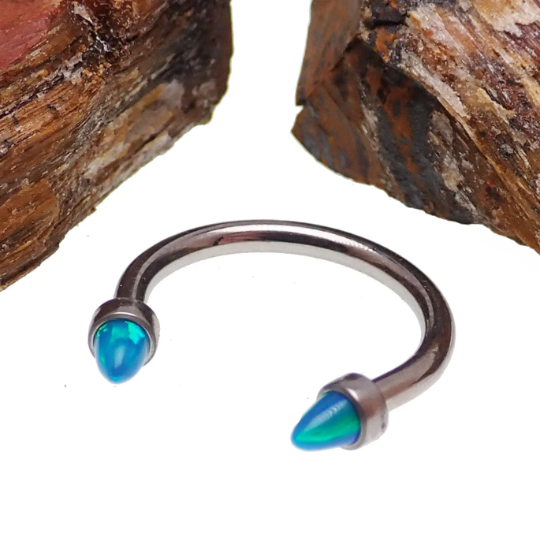 Black horseshoe piercing with 3mm spiked opal cone ends, 16g body jewelry by Body Clickers.