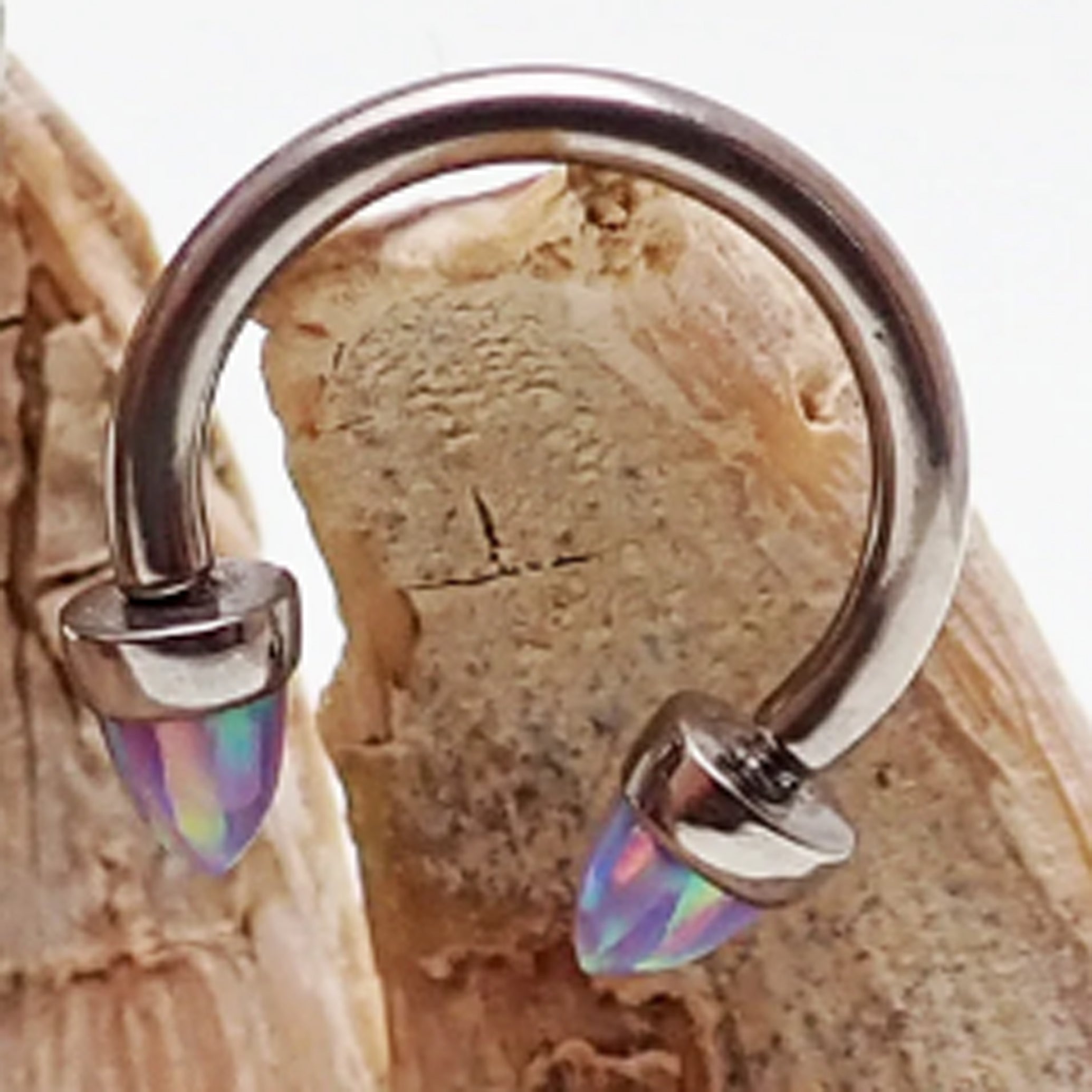 Black horseshoe piercing with 3mm spiked opal cone ends, 16g body jewelry by Body Clickers.