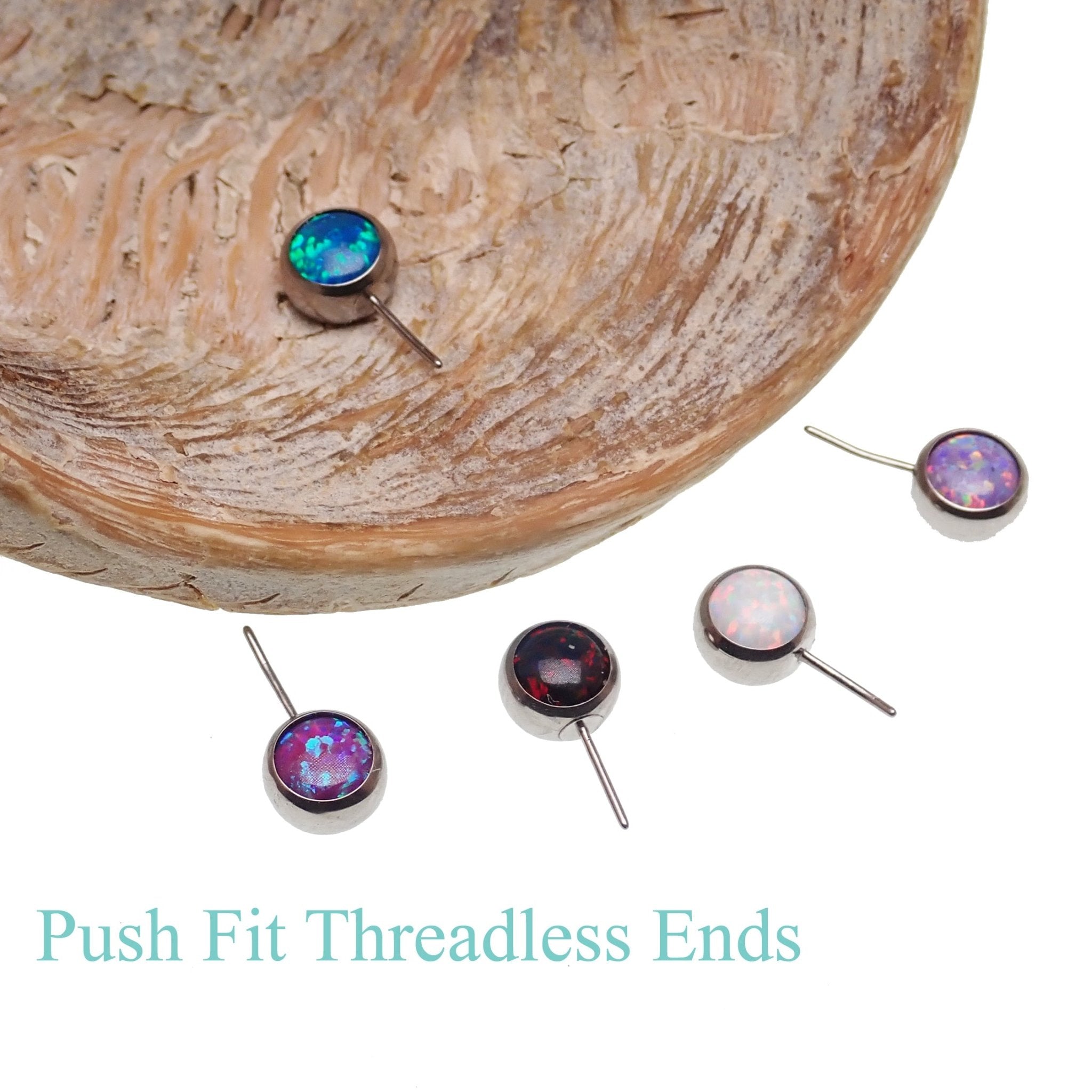 Black flame opal push fit side attachments for Body Clickers body jewelry, featuring vibrant opal accents and sleek design.