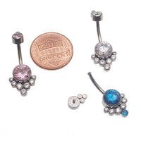 Blue and clear zircon cluster belly ring in 14g body jewelry by Body Clickers, featuring a decorative design for navel piercing.