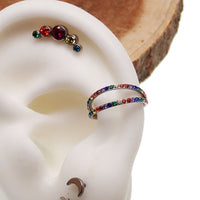 Titanium double-layered CZ conch clicker body jewelry in 16g with 10mm design from Body Clickers Body Jewelry