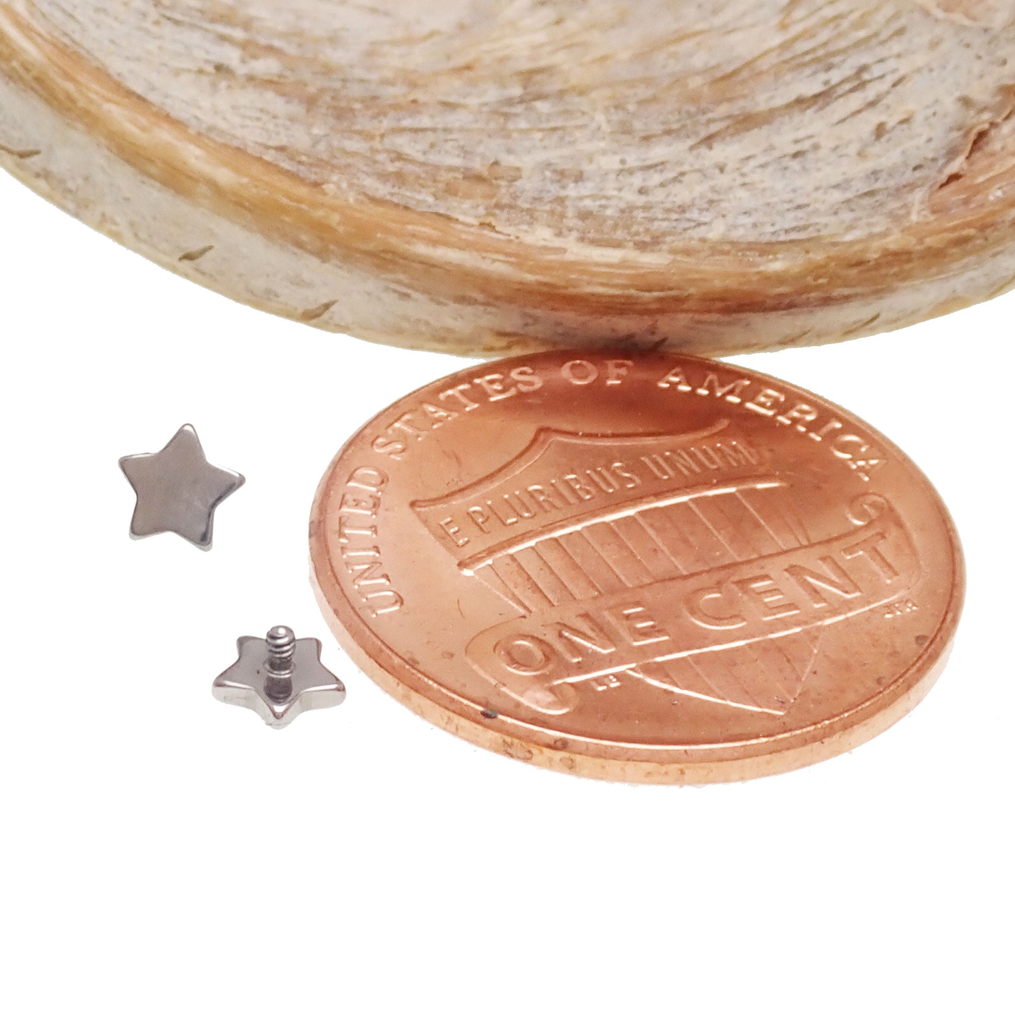 Star Dermal Titanium Top 14g body jewelry with a 3.5mm star design, crafted from durable titanium for body piercings.