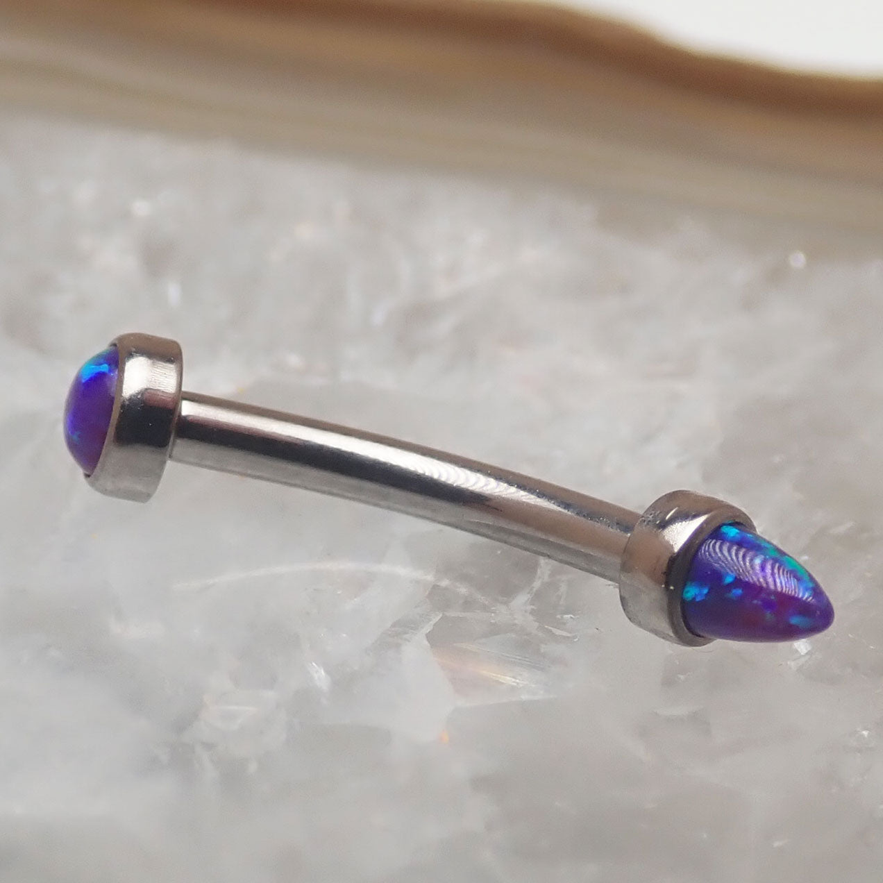 Micro Curve Titanium Piercing with Cone and Flat Top Opals in 16g, body jewelry by Body Clickers featuring black fire design.