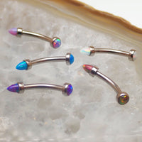 Micro Curve Titanium Piercing with Cone and Flat Top Opals in 16g body jewelry, featuring black fire design and titanium material.