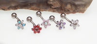Opal flower curved barbell body jewelry, 16g, with clear CZ stones, from Body Clickers Body Jewelry, showing the decorative floral design.