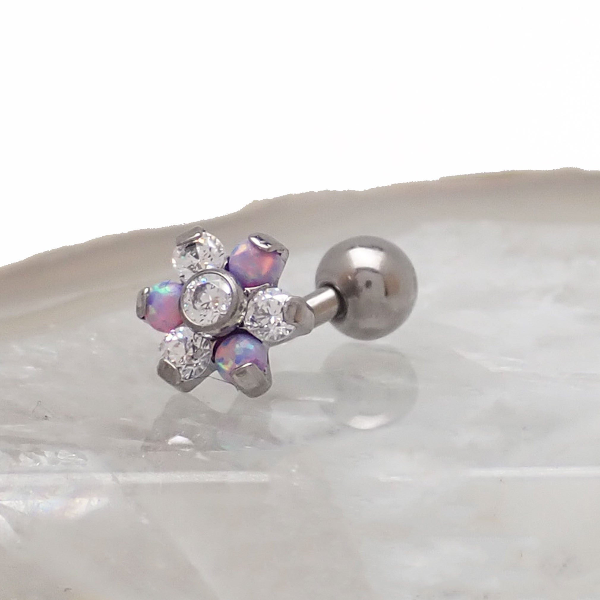 Opal flower curved barbell body jewelry in 16g with clear CZ stones, by Body Clickers Body Jewelry, showing the decorative design.