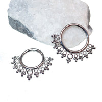 Beaded filigree titanium clicker 16g body jewelry with intricate design and silver-tone beads, suitable for piercings.