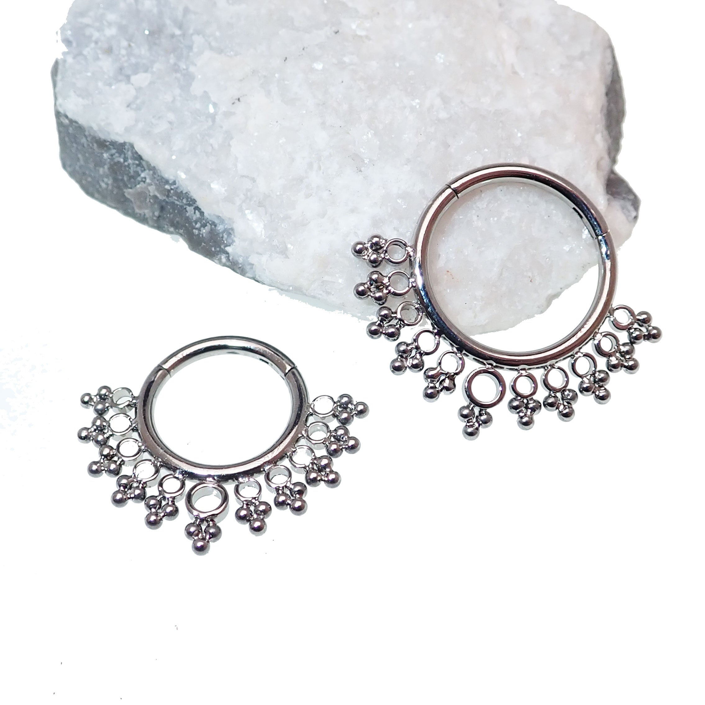 Beaded filigree titanium clicker 16g body jewelry with intricate design and silver-tone beads, suitable for piercings.