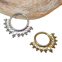 Beaded filigree titanium clicker body jewelry in 16g with intricate design and silver-tone finish.