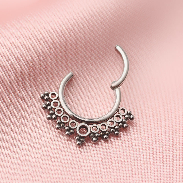 Beaded filigree titanium clicker body jewelry in 16g with intricate design, featuring a stylish and elegant body piercing accessory.