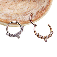 Titanium CZ leaf body jewelry clicker with 16g gauge, featuring a sleek leaf design, by Body Clickers Body Jewelry.