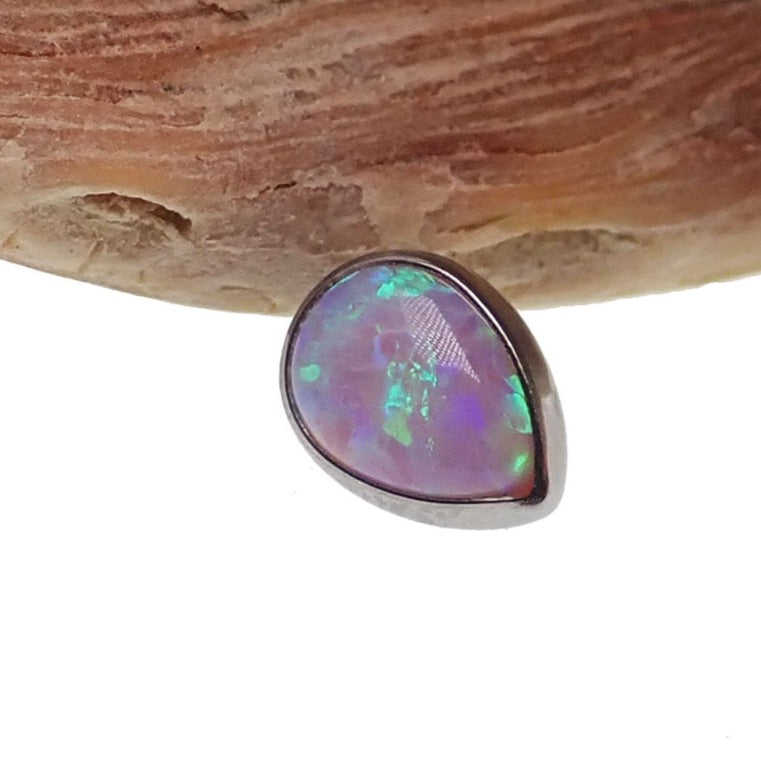 Titanium teardrop opal flatback body jewelry by Body Clickers, internally threaded, 14g, 6mm size, in bubblegum lilac color.