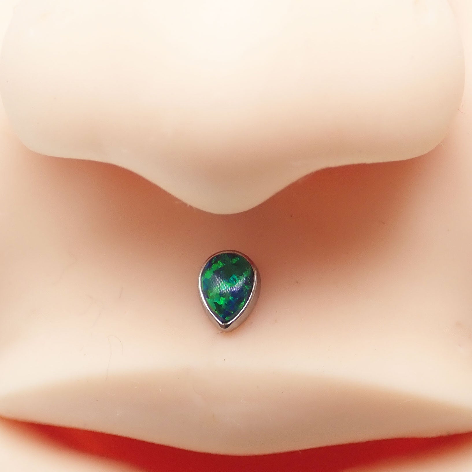 Titanium teardrop opal flatback body jewelry by Body Clickers, internally threaded, 14g, 6mm, in bubblegum lilac color.