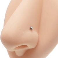 Four titanium nose bone studs in a pack, body jewelry by Body Clickers Body Jewelry, showcasing sleek, polished design.
