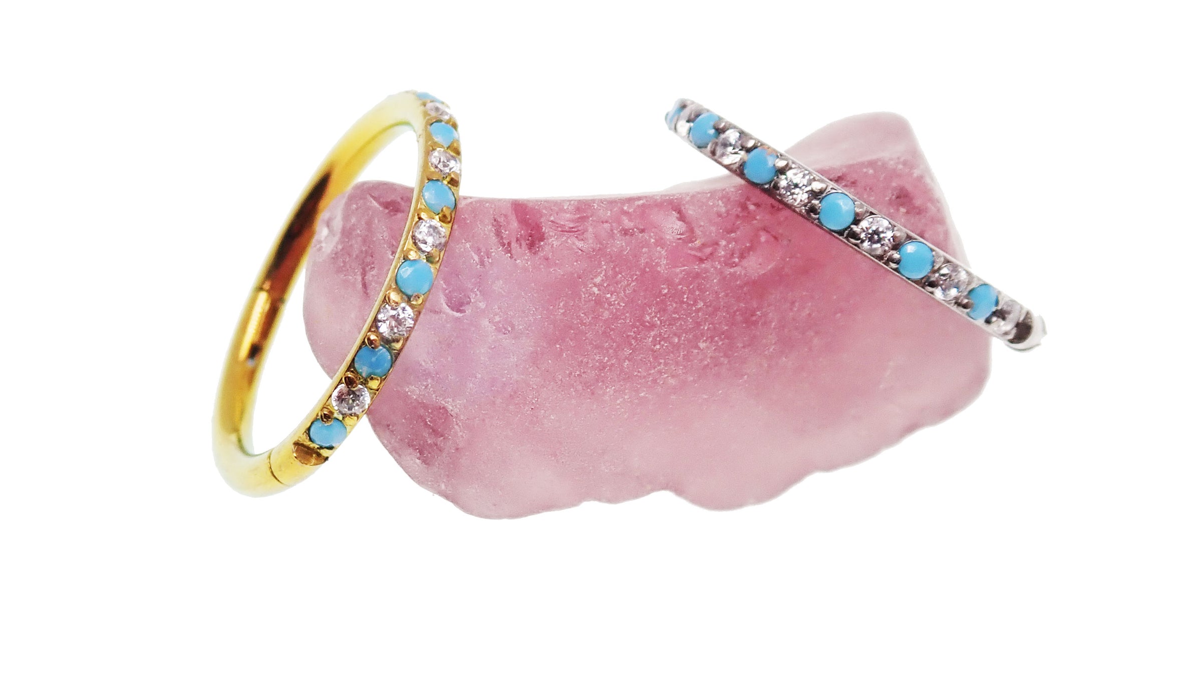 Side-facing turquoise and CZ alternating clicker body jewelry in 18g, featuring vibrant stones and a sleek design.