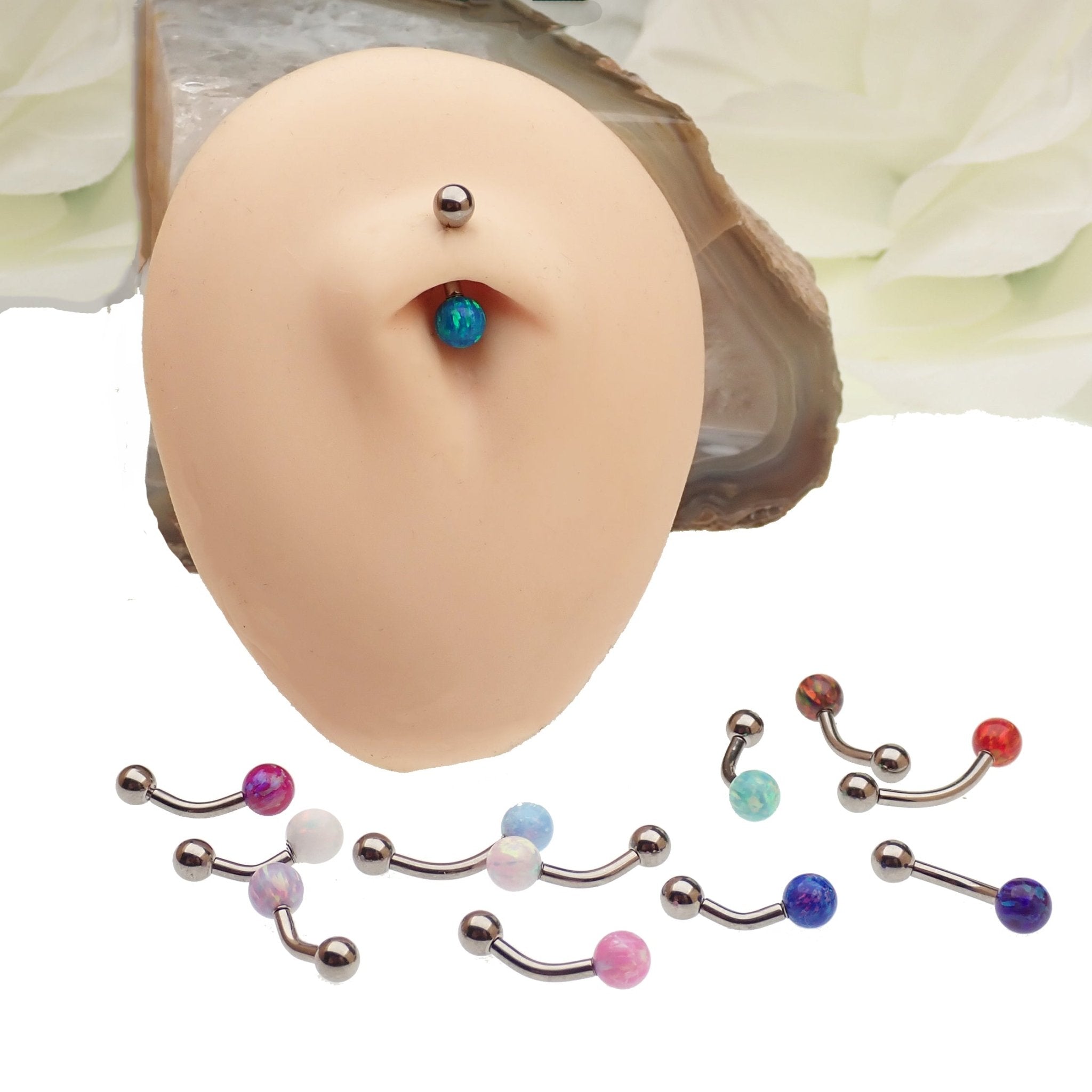 Curved 14g titanium belly piercing with pink opal gemstone from Body Clickers, featuring a smooth, rounded body jewelry design.