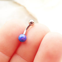 Curved 14g titanium belly piercing with pink opal gemstone from Body Clickers, showcasing a sleek body jewelry design.