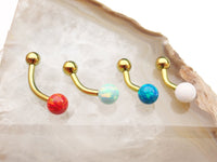 Curved titanium belly piercing with a 6mm opal gemstone, 14g body jewelry from Body Clickers featuring a bubblegum pink color.