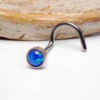 Body Clickers opal nose curl body jewelry in 20g with a vibrant bubblegum pink opal and curved design.