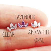 Clear CZ petal flower body jewelry by Body Clickers in 14g, 16g, and 18g with push fit flatback design.