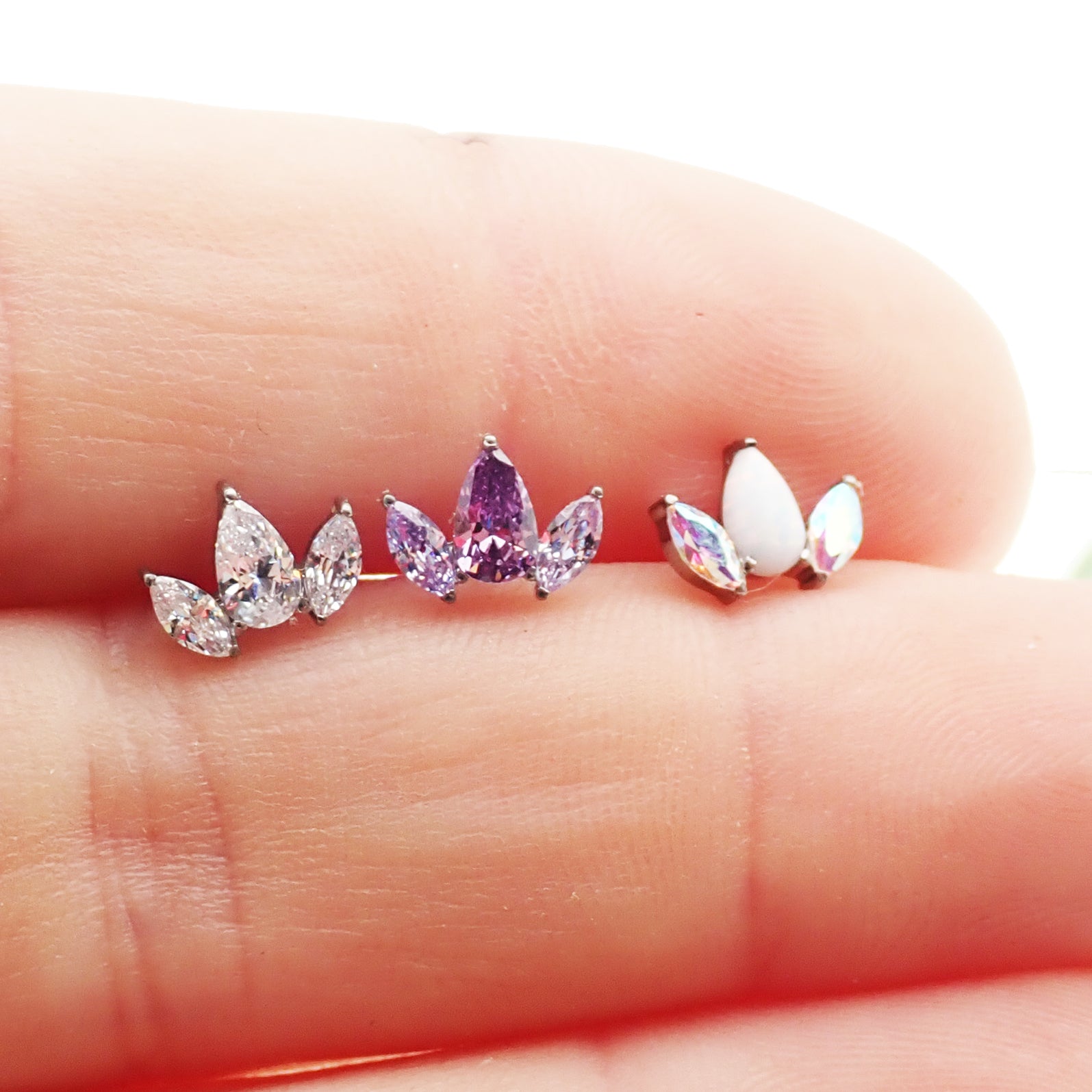 Clear CZ petal flower body jewelry by Body Clickers, push fit flatback design in 14g, 16g, and 18g gauges.