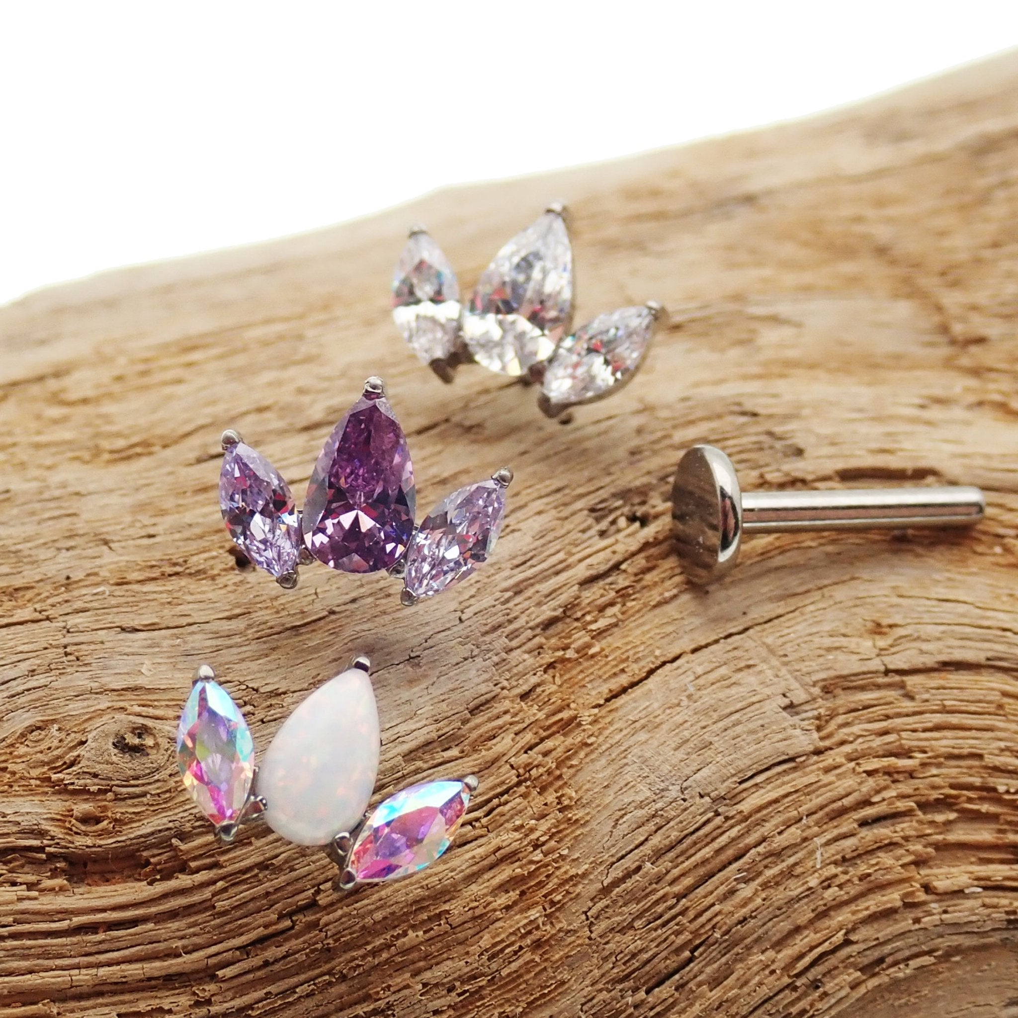 Clear CZ petal flower body jewelry by Body Clickers in 14g, 16g, and 18g with push-fit flatback for body piercing.