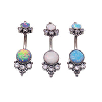 Body Clickers body jewelry with cornflower blue opal, CZ stones, and beads belly bar in 14g for body piercing.