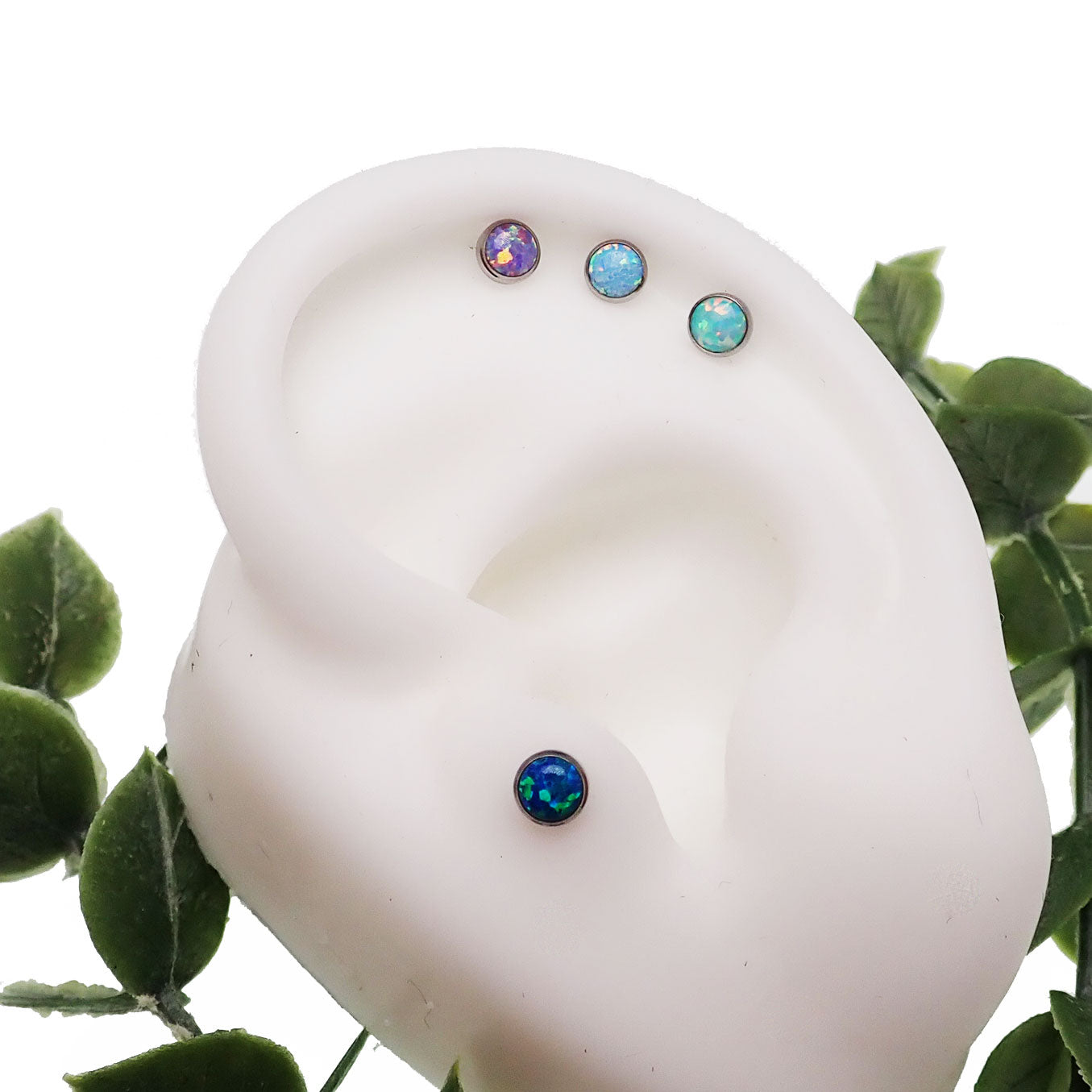 Fire Opal 4mm push fit flat back body jewelry by Body Clickers in 16g and 18g, featuring a vibrant cornflower blue design.