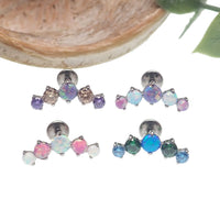 Body Clickers opal CZ blaze-set cluster flatback labret body jewelry in blue, pink, and white, available in 14g, 16g, and 18g sizes.