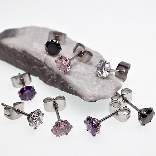 Three pairs of clear CZ prong earrings for body jewelry, 20g from Body Clickers featuring sparkling crystal accents.