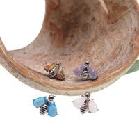Dark cherry Opal Bee Titanium flat back body jewelry by Body Clickers in 14g, 16g, and 18g sizes.