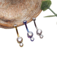 14g titanium belly bar with three CZ stones and 10mm length body jewelry from Body Clickers.