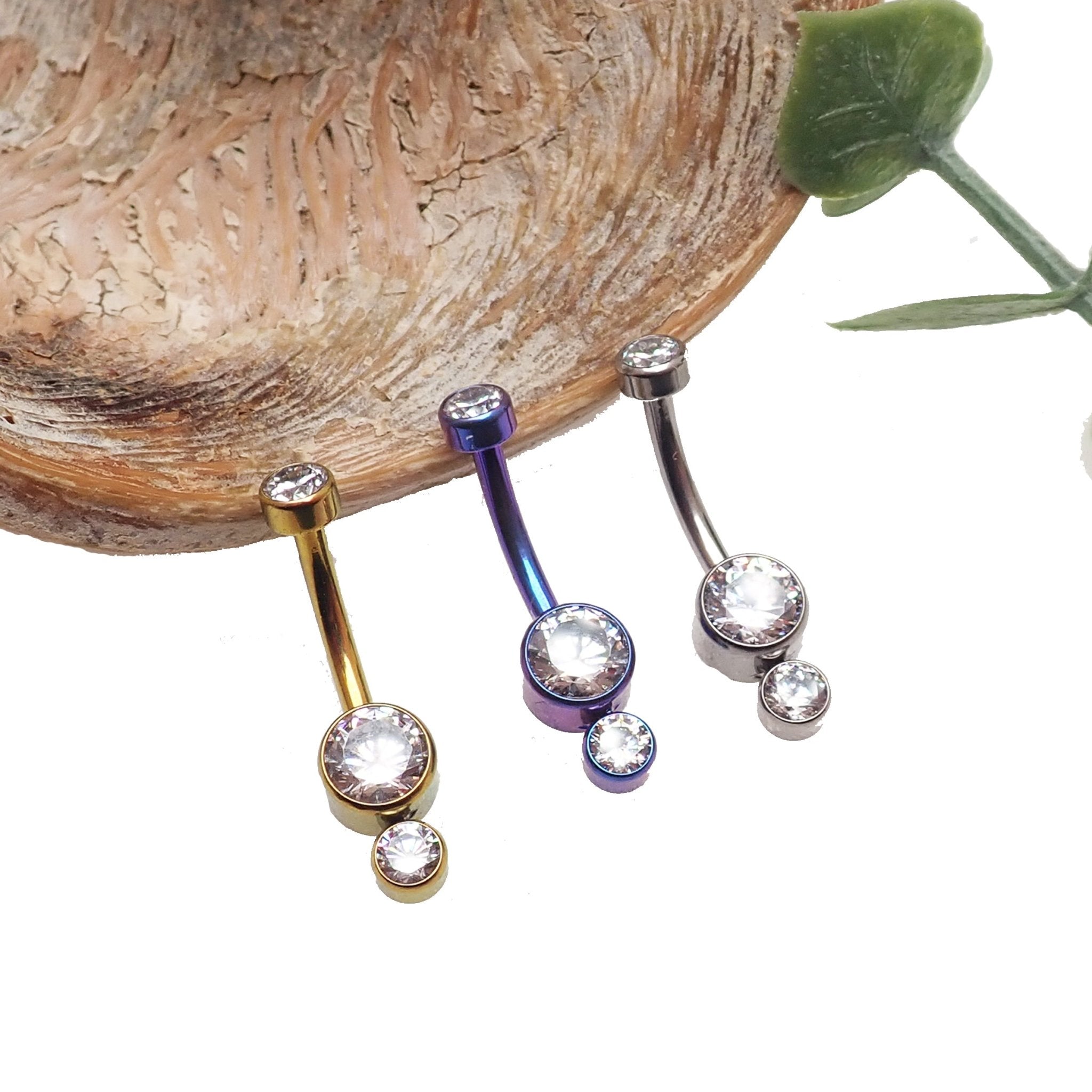 14g titanium belly bar with three CZ stones and 10mm length body jewelry from Body Clickers.