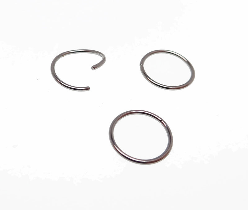 Set of three Body Clickers seamless steel hoop rings, 20g gauge and 8mm diameter, ideal for body jewelry and piercing.
