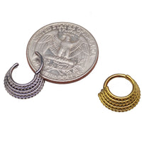 5-tier stacked engraved clicker body jewelry with detailed design, showcasing a trendy and stylish piece for piercings.