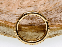 CZ 14k gold hinged clicker ring, 16g body jewelry with a sleek design, perfect for piercing and stylish body adornment.