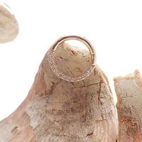 CZ crystal 14k gold hinged clicker body jewelry with 8mm size, featuring a secure hinged design and sparkling CZ stones.