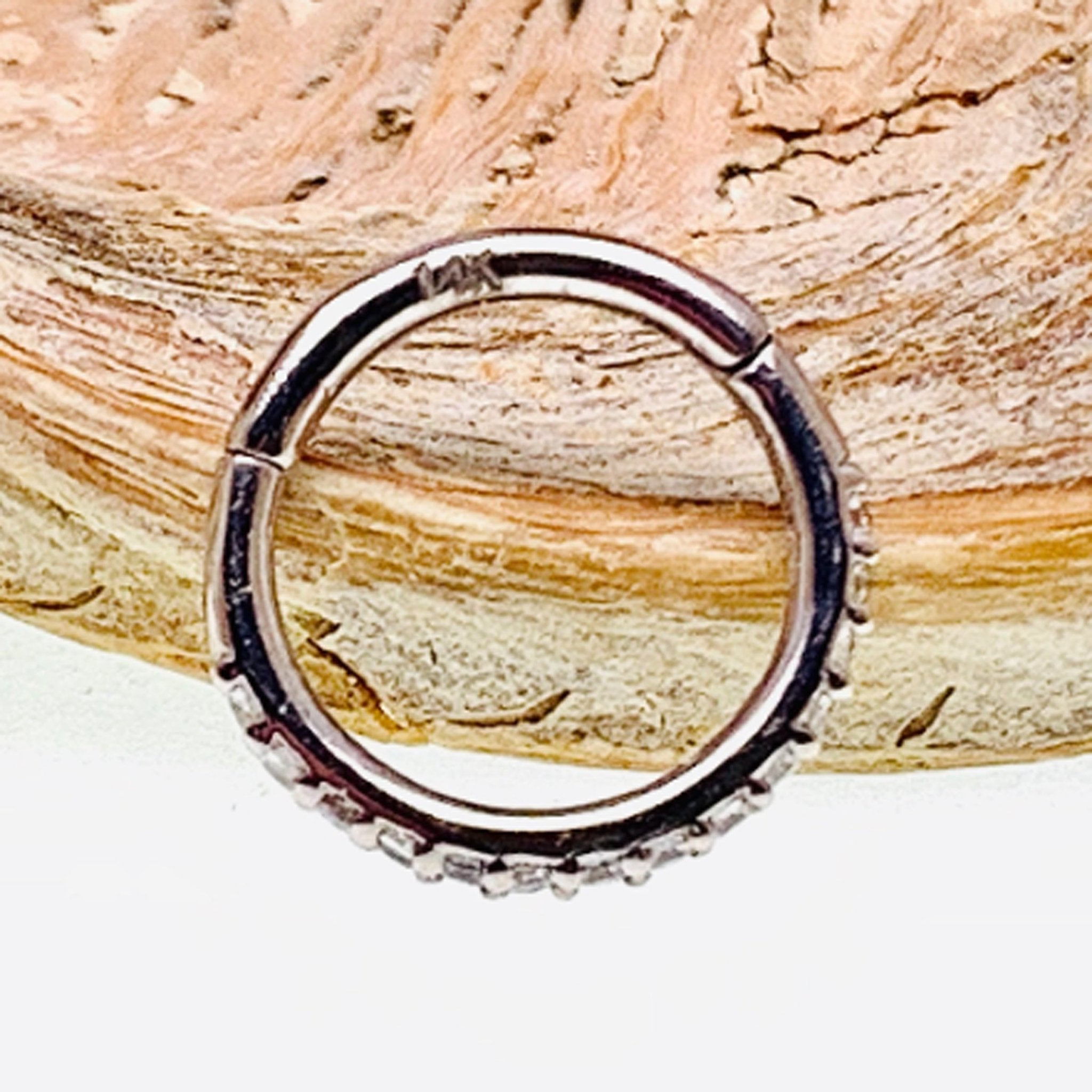 CZ Crystal 14k white gold hinged 8mm clicker ring for body jewelry with sparkling crystal accents and smooth hinge closure.