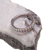 Double row opal clicker body jewelry in 16g by Body Clickers, featuring sparkling opal stones and sleek silver design.