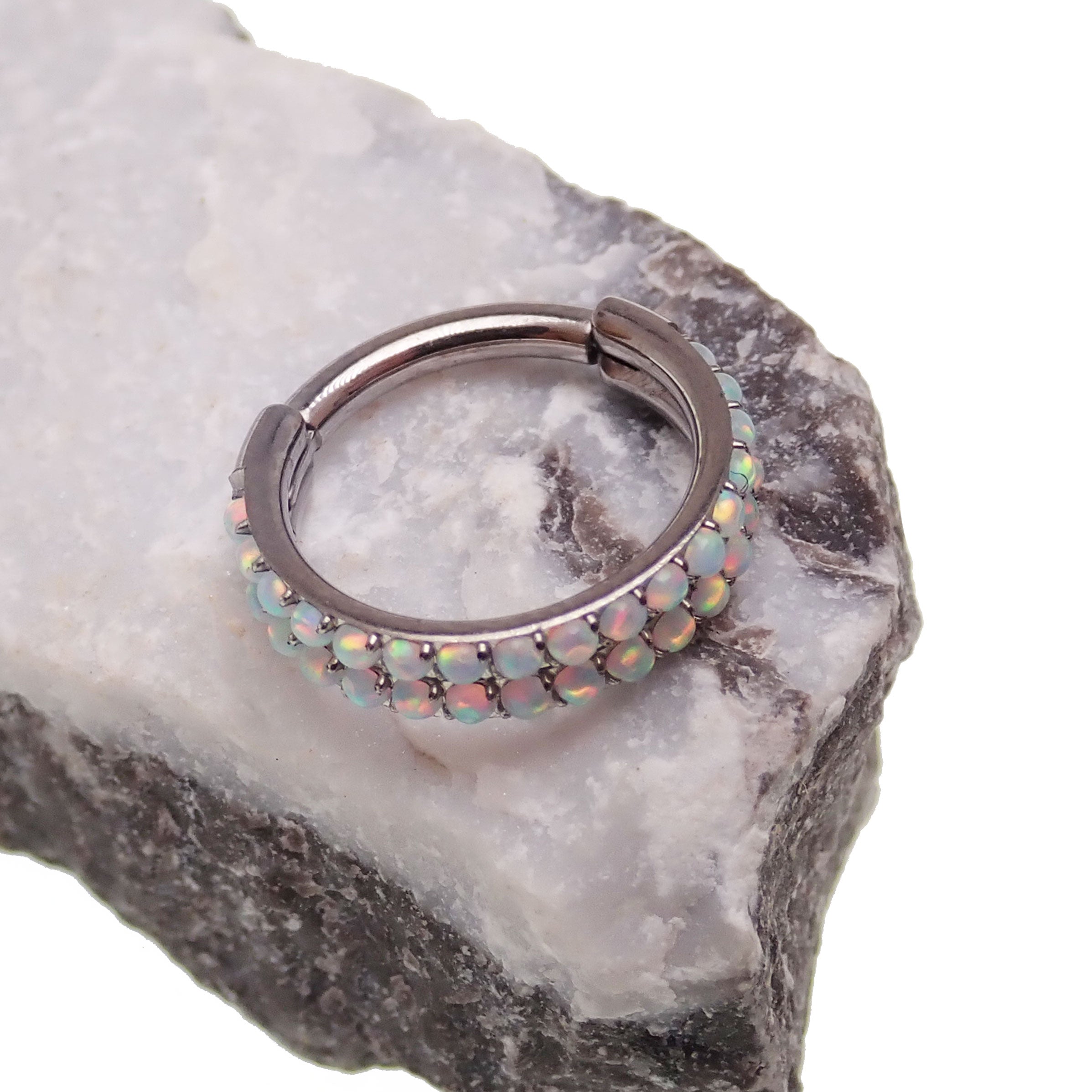 Double row opal clicker body jewelry in 16g by Body Clickers, featuring sparkling opal stones and sleek silver design.